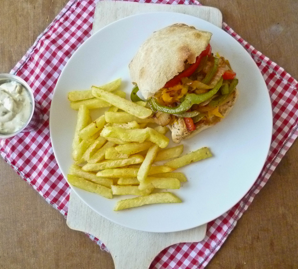 Cajun Chicken Sandwich on Ciabatta with Grilled Peppers and Garlic Seasoned Fries