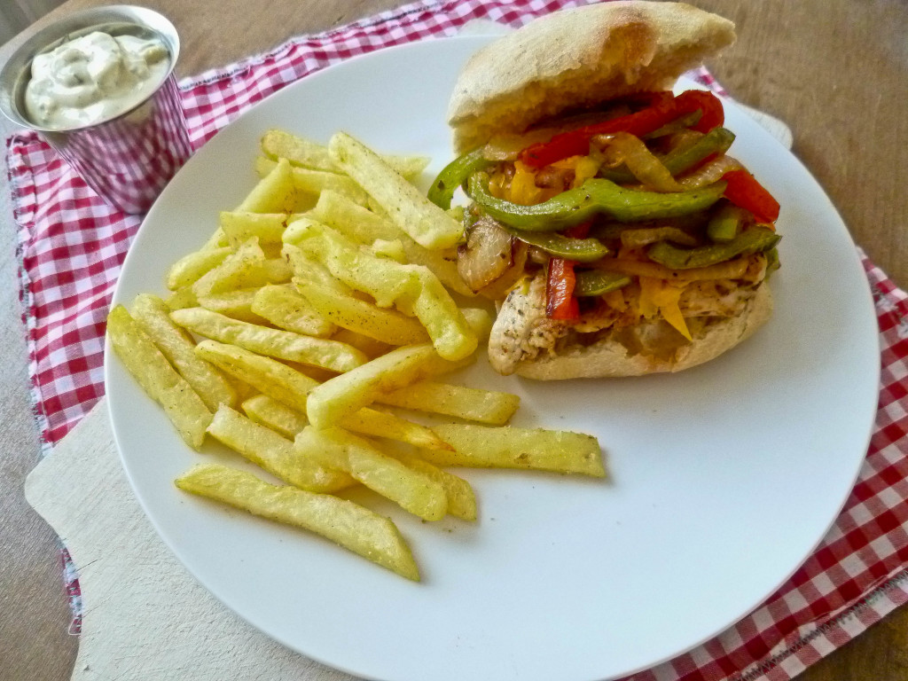 Cajun Chicken Sandwich on Ciabatta with Grilled Peppers and Garlic Seasoned Fries