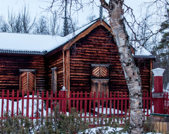 Cozy cabin in the snow in Lapland