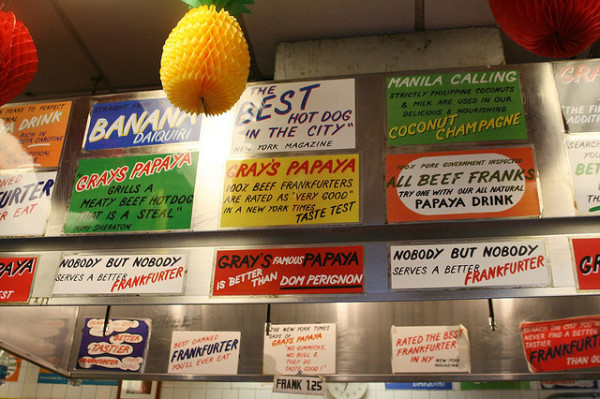 Menus posted inside Grey's Papaya hot dog stand