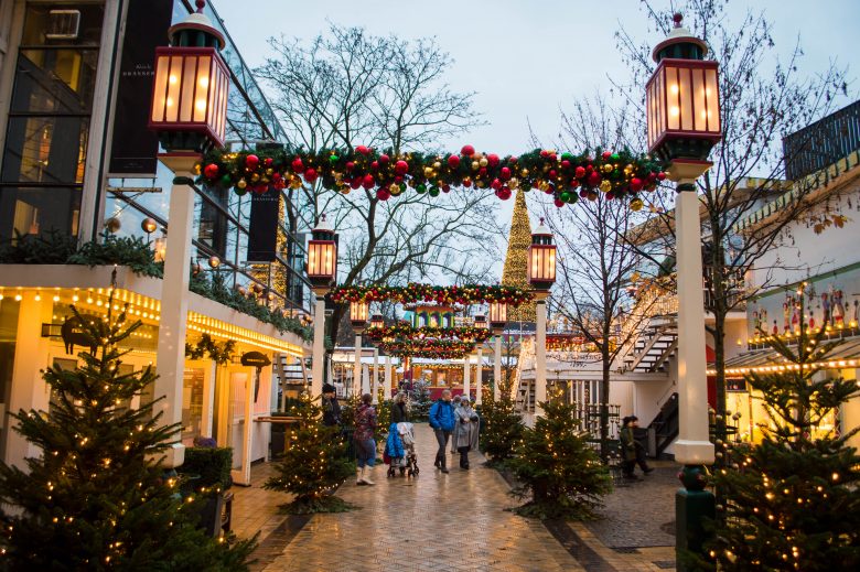 Walkway in Tivoli Gardens decorated in pretty lights and Christmas trees