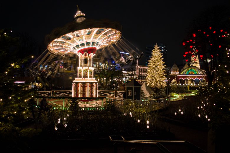 Night scene of the rides at Tivoli Gardens in Copenhagen all lit up