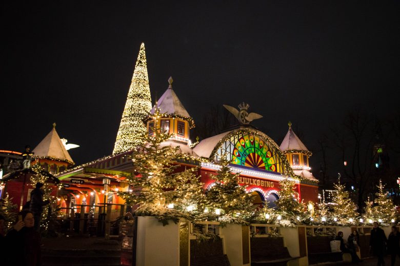 Beautiful lights of the decorative train station inside Tivoli Gardens