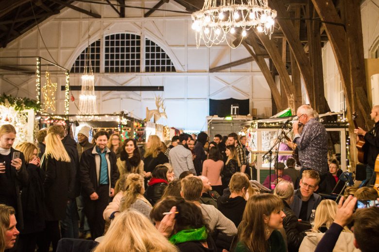 Crowds and live music inside the Christiania Christmas Makert Copenhagen