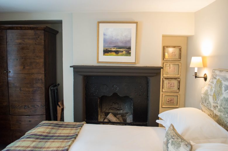 The fireplace in the bedroom at The Lord Crewe Arms