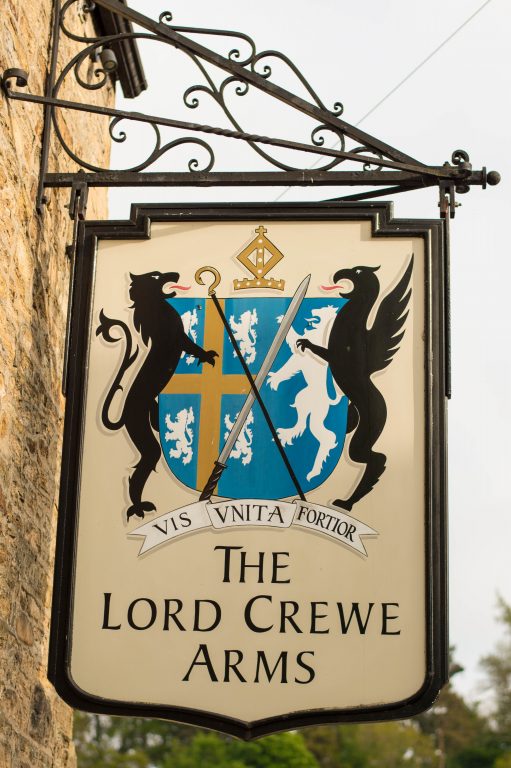 Sign hanging outside The Lord Crewe Arms, Northumberland