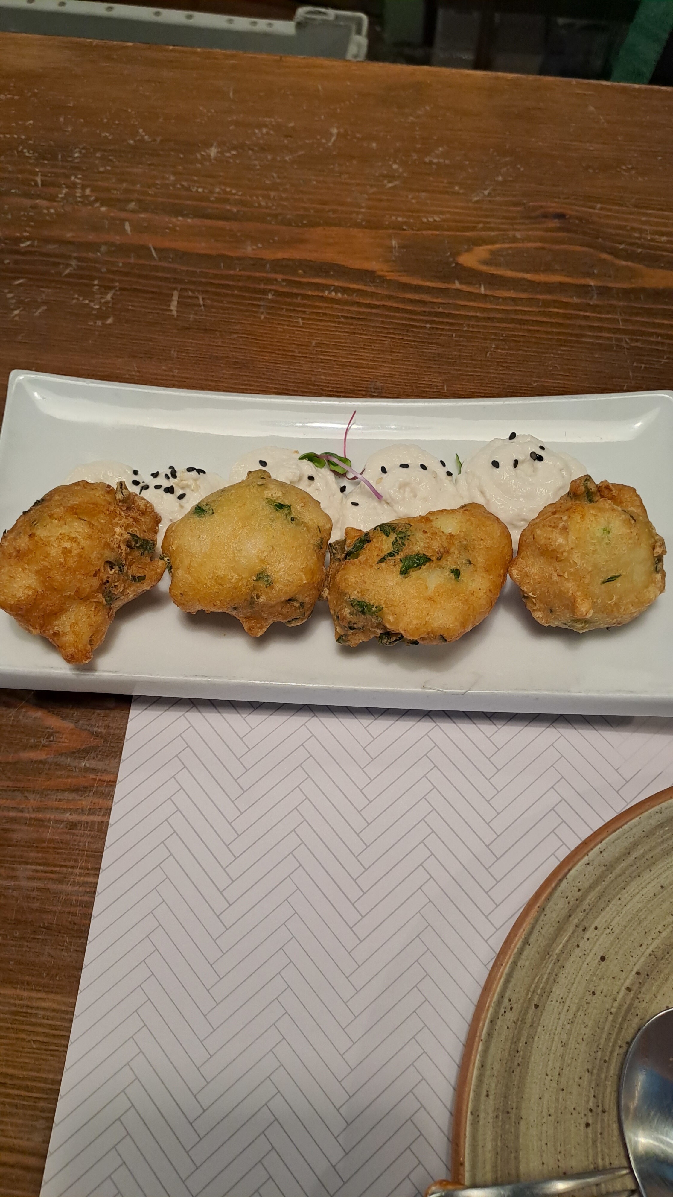 Plate of salt cod fritters at la brunilda