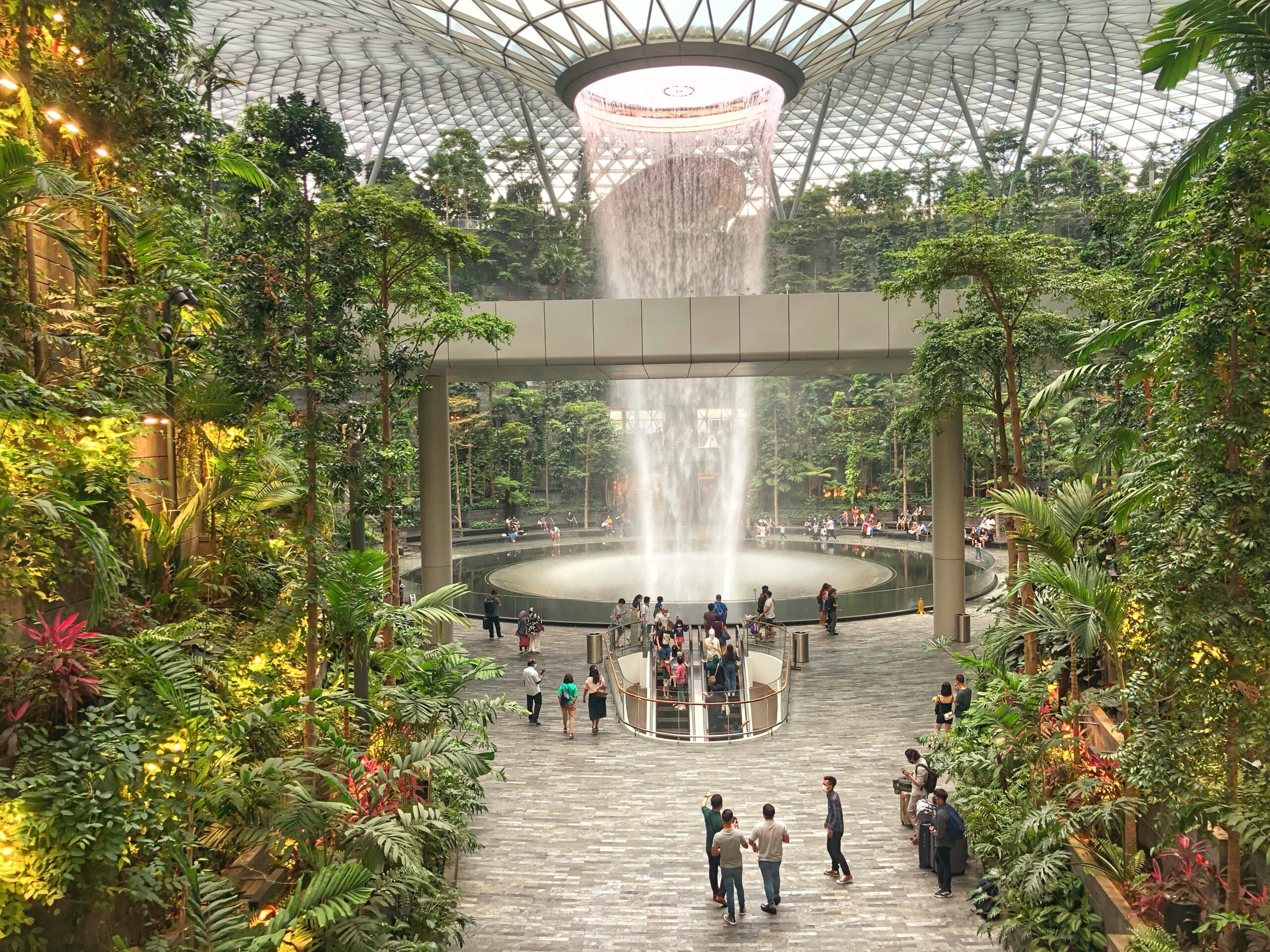 A cascading waterfall and lush greenery at Singapore Changi Airport