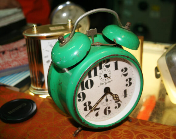 green vintage alarm clock