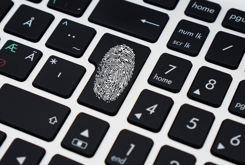 Thumbprint sensor key on computer keyboard