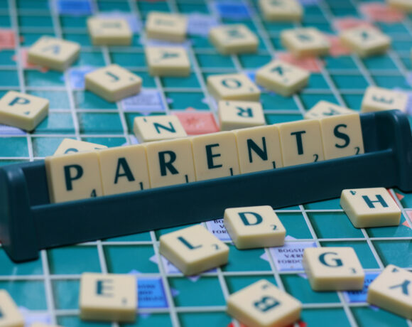 scrabble board that says Parents