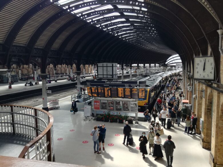 Passengers inside York Railway Station in England. 
