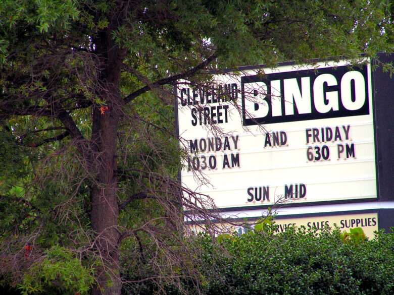 bingo sign outside surrounded by trees