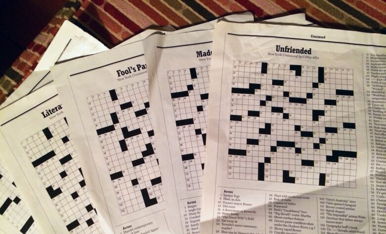 crossword puzzles on a couch cushion
