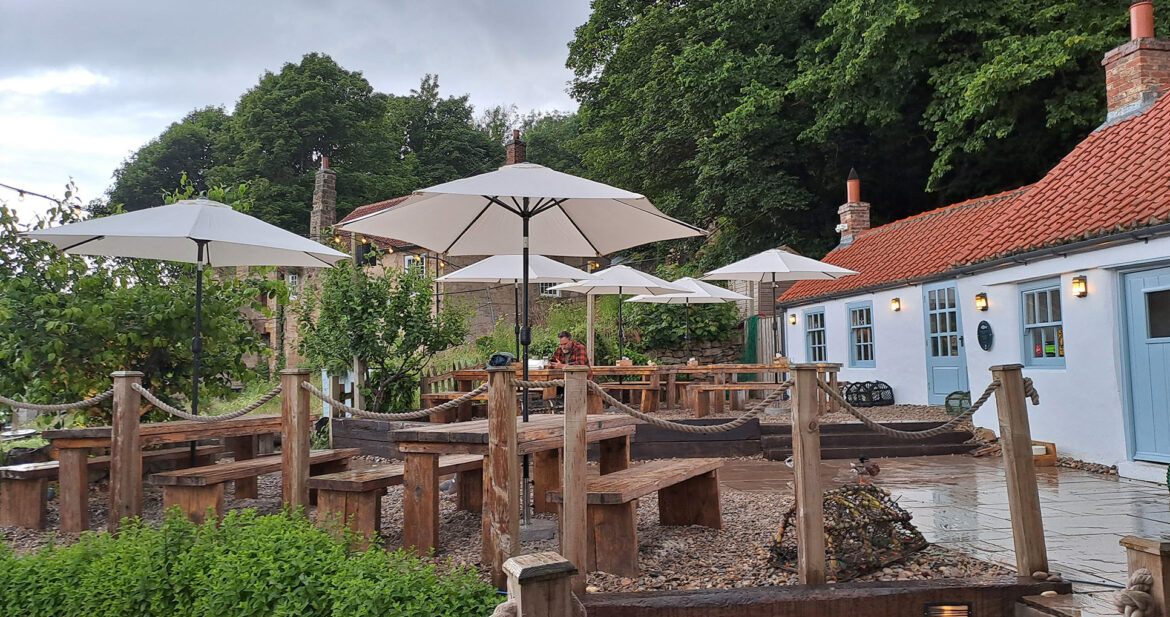 The outdoor seating area at The Fish Cottage in Sandsend