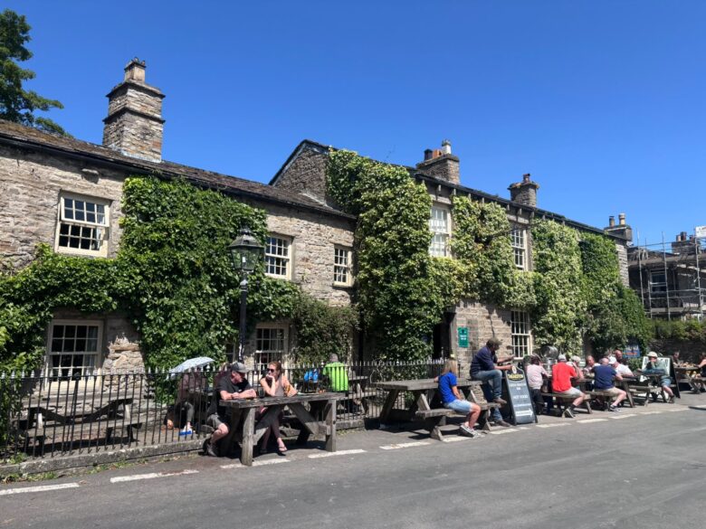 The beer garden at the front of the Green Dragon pub in Hardraw - the Drovers Arms in All Creatures Great and Small