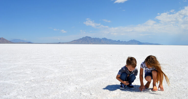Two children looking at the salt flats